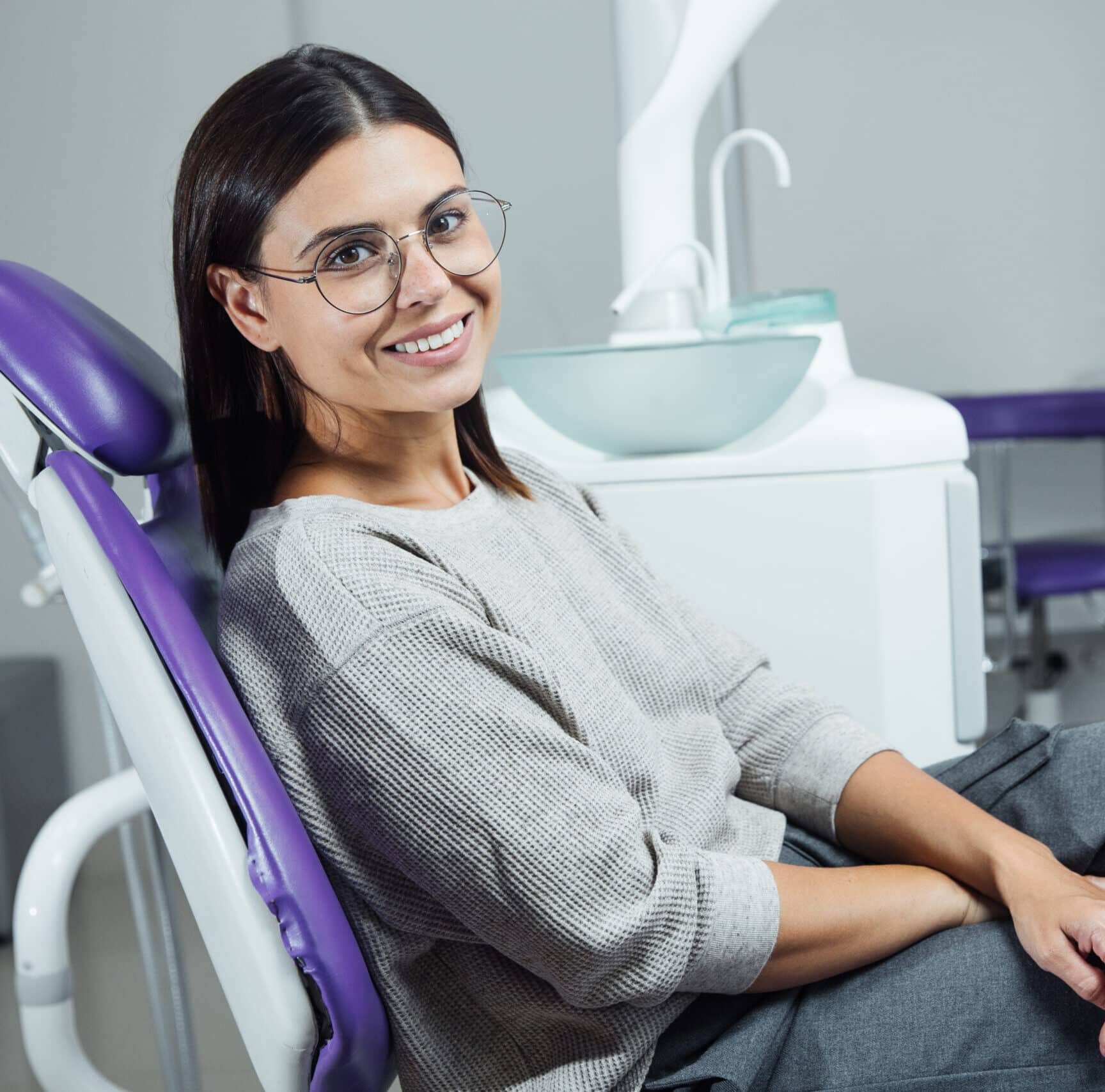 Young,Female,Patient,Sitting,On,Chair,In,Dental,Office.,Preparing