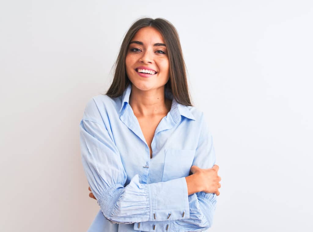 Young,Beautiful,Woman,Wearing,Blue,Elegant,Shirt,Standing,Over,Isolated