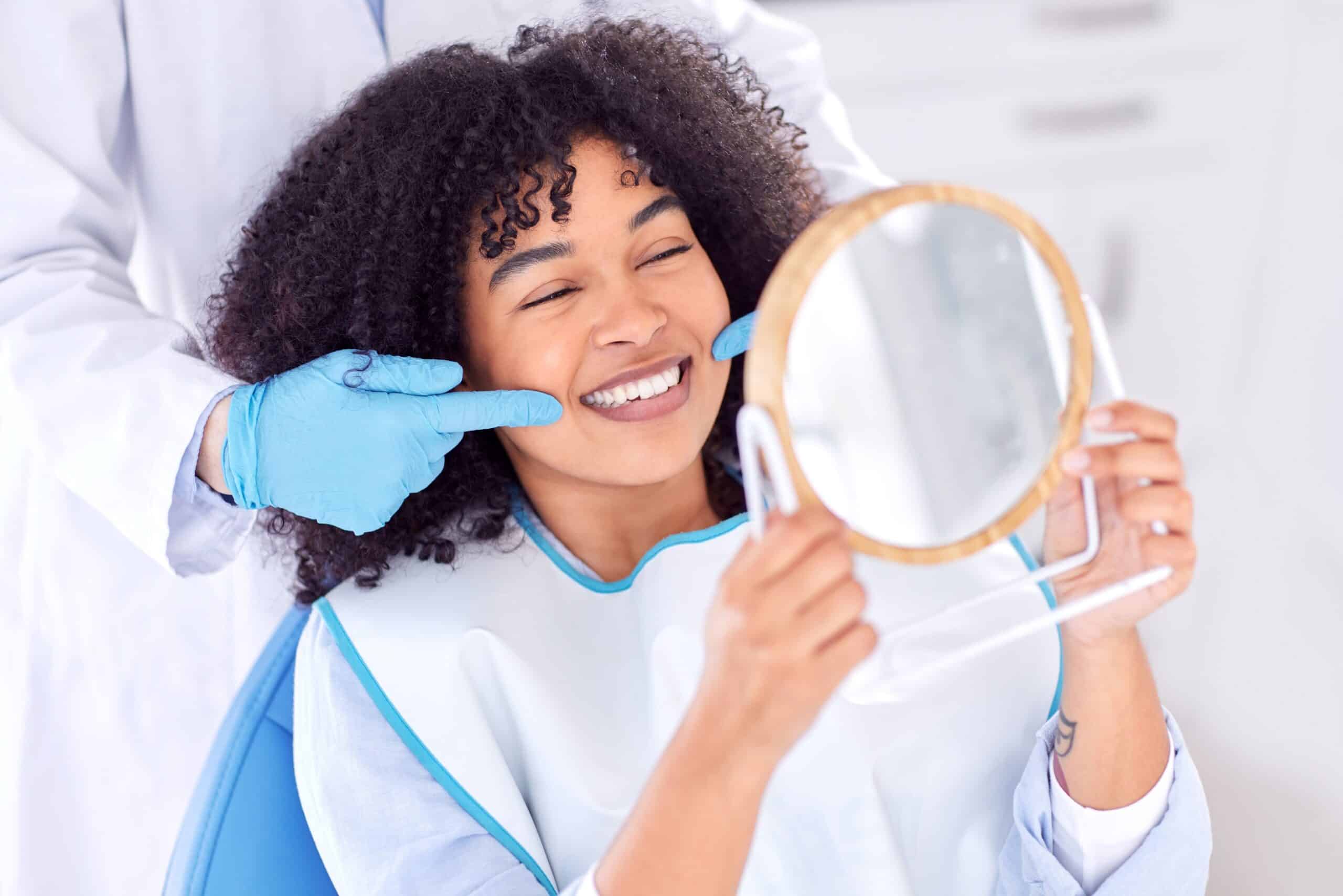 Woman,,Patient,And,Dentist,With,Mirror,For,Teeth,Whitening,In